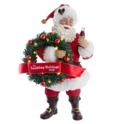 Kurt Adler 10.5-Inch Fabriché™ Coca-Cola® Battery Operated Santa With Lighted Wreath