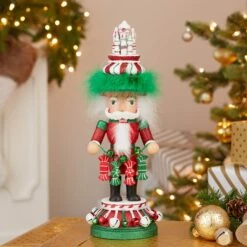 Kurt Adler 15-Inch Hollywood Nutcrackers™ Red, White And Green Candy Tower Hat Nutcracker -Kurt Adler Shop ha0657 50 3e0a9938 8beb 4b03 ade0 e80c3dca5e8b